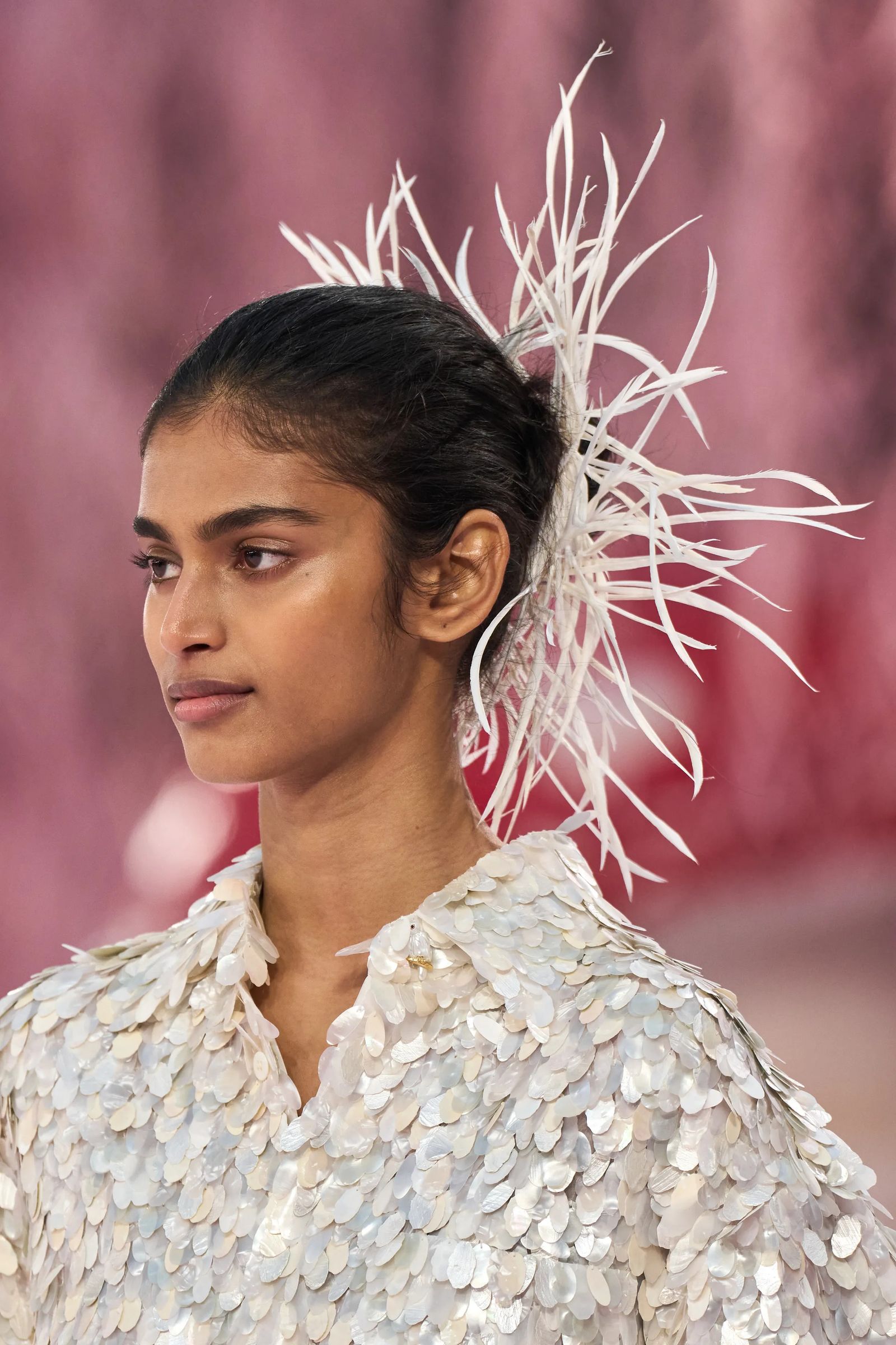 Image may contain Body Part Face Head Neck Person Adult Hair and Black Hair