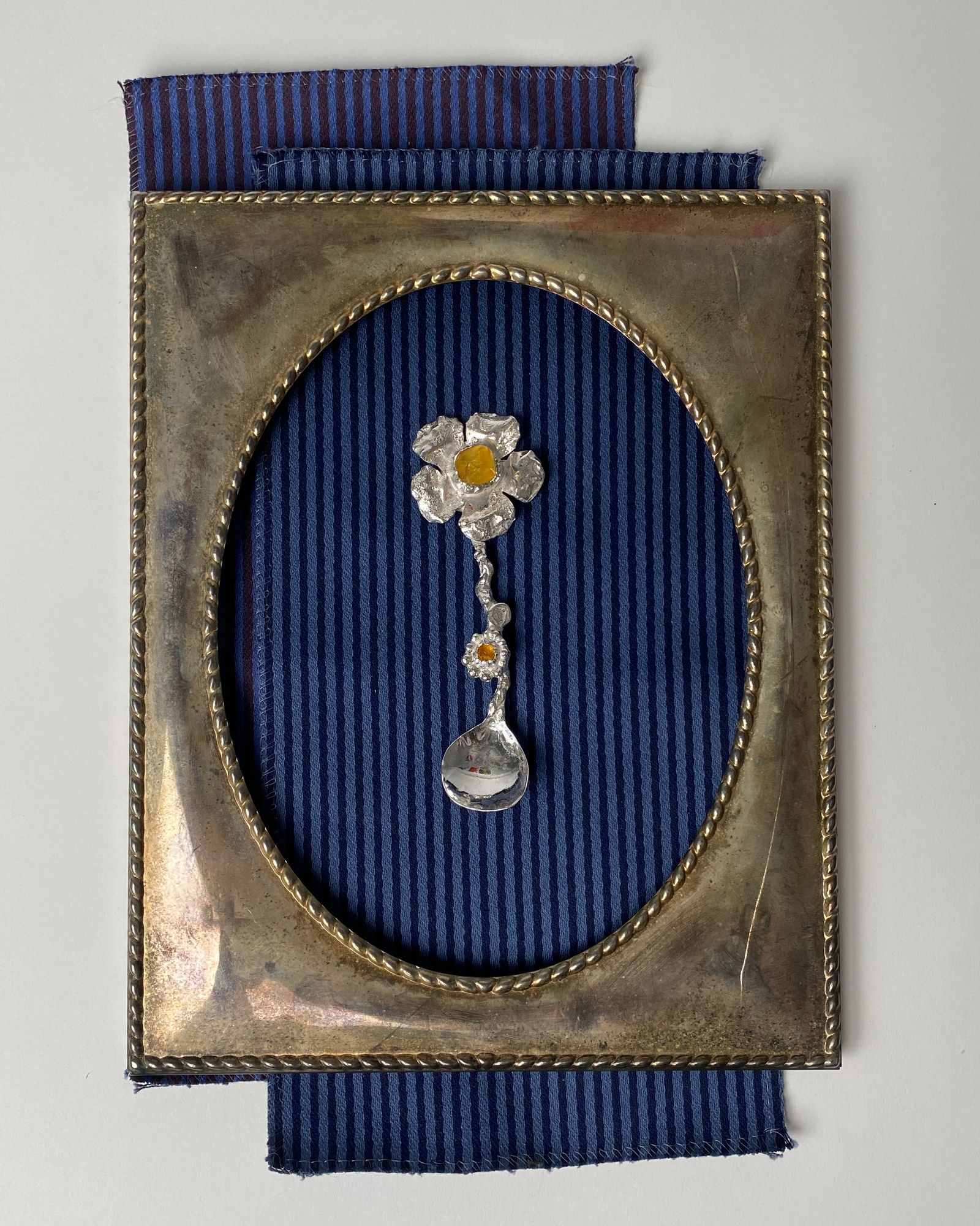 Image may contain Cutlery Accessories Spoon and Jewelry