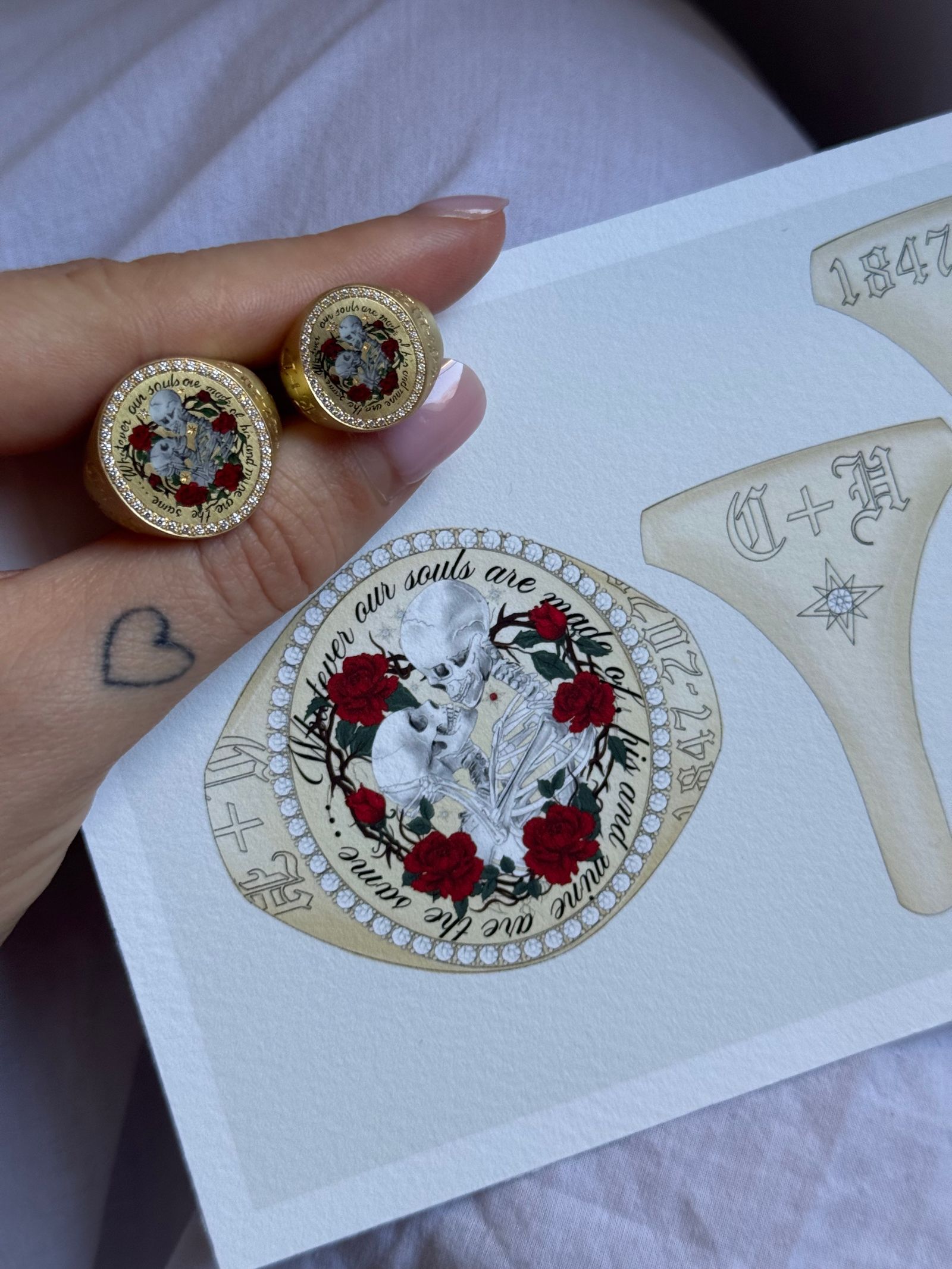 Image may contain Accessories Jewelry Locket Pendant Person Skin and Tattoo