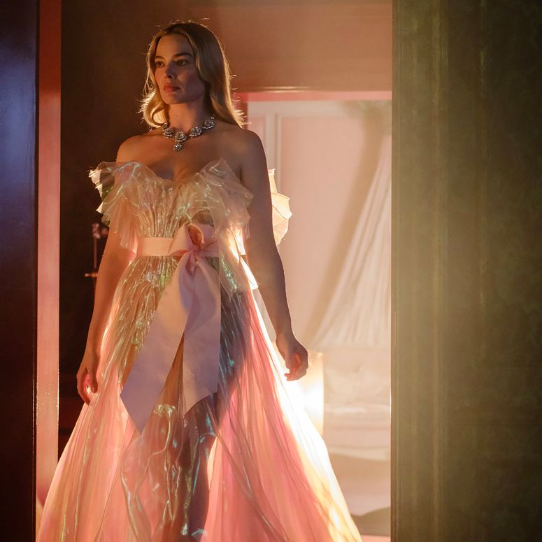 Image may contain: Margot Robbie, Clothing, Dress, Formal Wear, Evening Dress, Fashion, Gown, Adult, Person, and Wedding