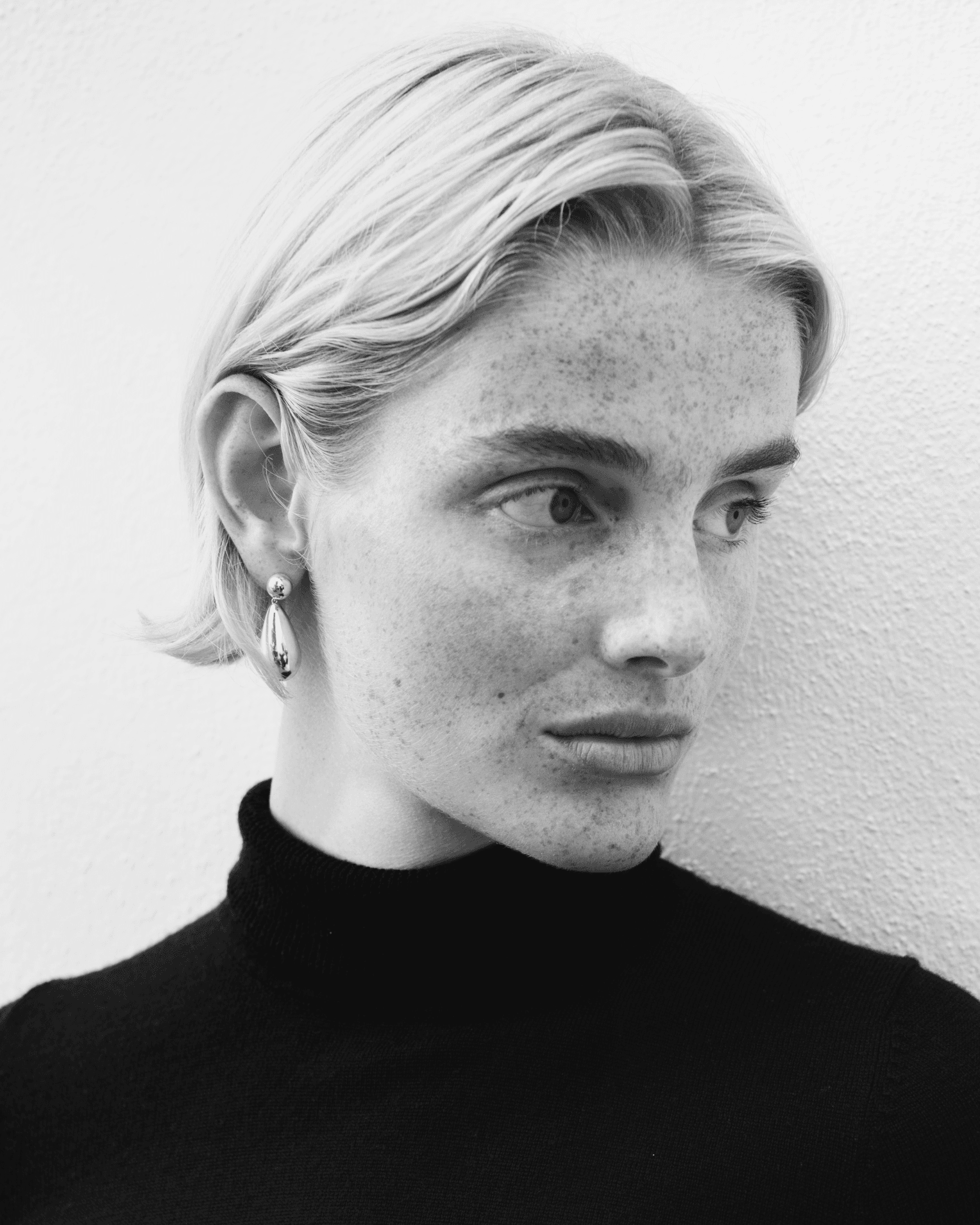 Image may contain Face Head Person Photography Portrait Adult Body Part Neck and Freckle